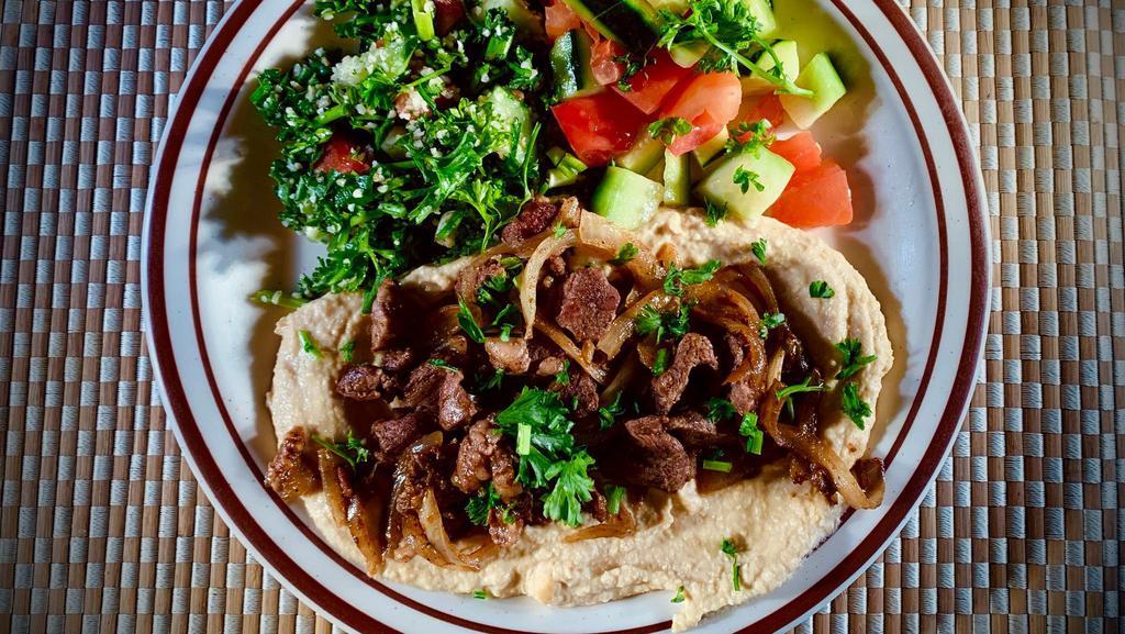 #9 Hummus Bel-Laham · Hummus topped with choice of specially seasoned grilled meat. Includes hummus, optional House Salad (Tabouli, Mediterranean Salad, Red and Green Pickled Cabbage, Potato Salad and Salsa).