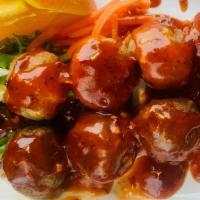 Deep-Fried Beef Meatballs (4)  · This portable Thai-style street food is four beef meatballs on a stick that is deep-fried an...