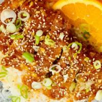 Orange Chicken  · White Rice, House-Made Orange Chicken, Orange Slices, Green Onion, Sesame Seeds