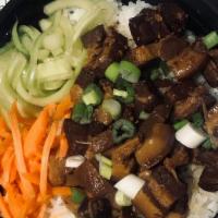 Chashu Style Pork Belly · Chashu or Soy Sauce Based Pork Belly Served with White Rice, Cucumber, Carrots, and Green On...