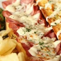 Hot Club Sandwich · Ham, bacon, lettuce, tomatoes, cheddar and mozzarella.