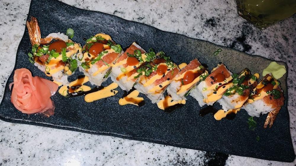 Dragon Roll · Spicy tuna, tempura fried shrimp, avocado, jalapeño. Topped with Japanese spicy mayo, eel sauce, sriracha.
