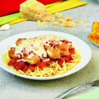 Chicken Parmesan · Breaded chicken in marinara sauce, served over spaghetti, topped with mozzarella cheese and ...