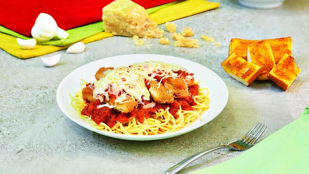 Chicken Parmesan · Breaded chicken in marinara sauce, served over spaghetti, topped with mozzarella cheese and parmesan cheese.