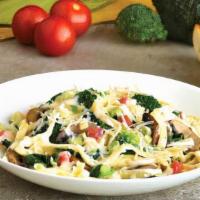 Veggie Fettuccine Alfredo · Broccoli, mushrooms, spinach, and tomatoes in our alfredo sauce, served over fettucine, topp...