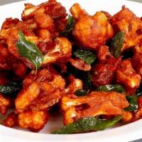 Gobi 65 · Vegetarian. Marinated and fried cauliflower cooked in Indian masala.