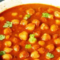 Channa Masala · Vegetarian. Garbanzo beans cooked with onions, tomatoes and special spices.