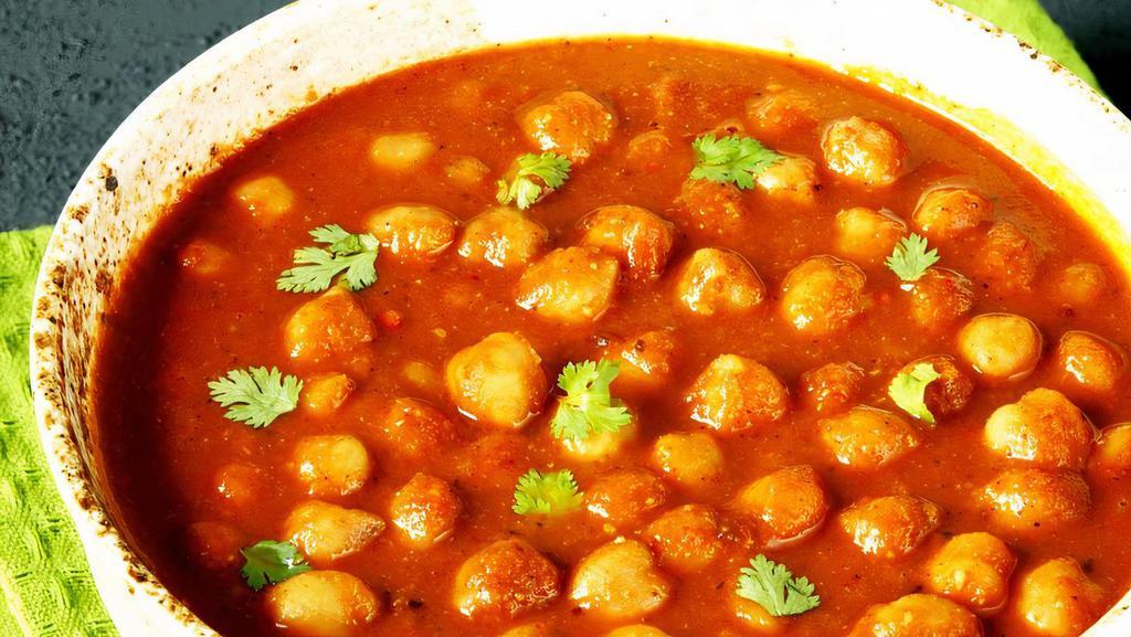 Channa Masala · Vegetarian. Garbanzo beans cooked with onions, tomatoes and special spices.