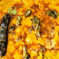 Dal Tadka · Vegetarian. Traditional Indian yellow lentil cooked with spices, cumin, mustard, garlic and ...