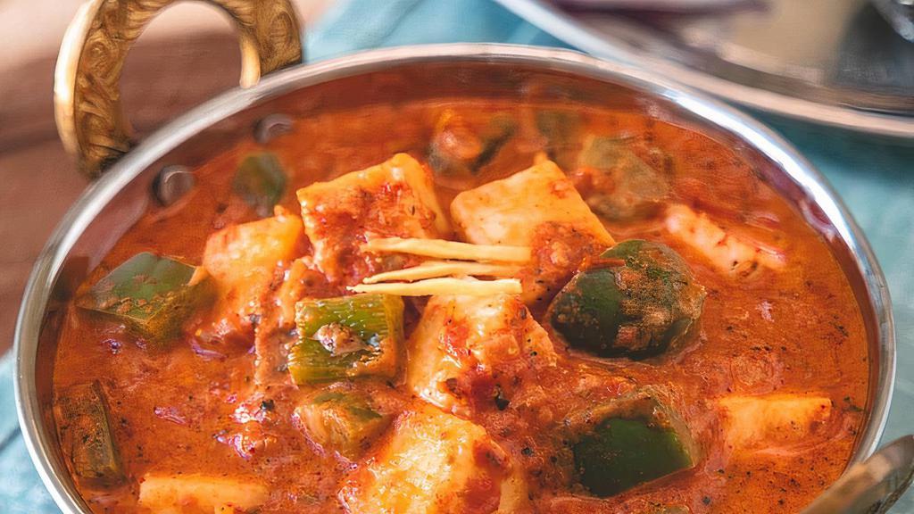 Kadai Paneer · Vegetarian. Paneer cooked with crushed whole spices, peppers, tomatoes and onions cooked in delicious creamy gravy with cashew paste.