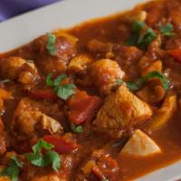 Chicken Jalfrezi · Boneless chicken cooked with roasted ground exotic spices and stir fry with vegetables.
