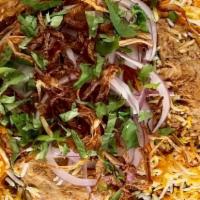 Lamb Biryani · Boneless lamb cooked with spices and tomatoes, layered in basmati rice and exotic spices.