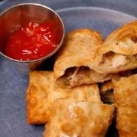 Cheesesteak Rolls · Crispy eggrolls filled with Philly style steak meat, American cheese, grilled peppers and on...