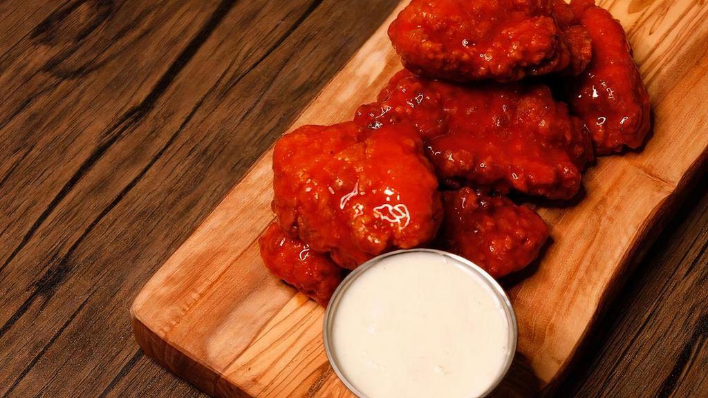 Boneless Wings · Crispy chunks of chicken breast tossed in any one of our wing sauces