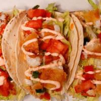 Fish Tacos · Battered cod, lettuce, pico de gallo, and chipotle mayo served in 3 soft shells