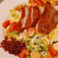 Crispy Chx Salad · Mixed greens, tomatoes, bacon, hard boiled egg, croutons, Jack & cheddar cheese topped with ...