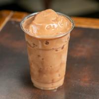 Coffee Crusher Protein Smoothie · Coffee, dates, coconut, honey, banana, apple juice, cashew milk, and vanilla protein.
