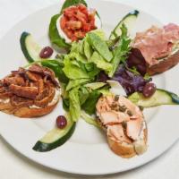 Crostini Board · Selection of the following served on grilled baguette: Brie cheese, thin sliced prosciutto a...