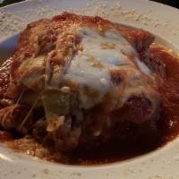 Homemade Beef Lasagna · Lasagna sheets layered with fresh sauteed ground beef, Italian herbs, ricotta and organic ho...