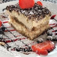 Drunken Tiramisu · Two layers of Ladyfingers soaked in coffee and Kahlua filled with heavy cream mixture stacki...