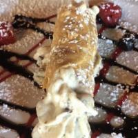 Homemade Cannoli · Our cannoli cream consists of ricotta cheese, chocolate chips, and Grand Marnier, because wh...