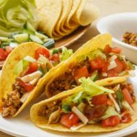 Taco Plate · Yummy crispy or soft. 3 tacos filled with your choice of shredded chicken or ground beef top...