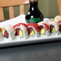 Tuna Trio Roll · Spicy tuna with avocado and topped with tempura crunch, tuna and white tuna.