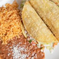 2 Tacos Any Meat Combination · Choice asada pastor carnitas beef fish or chicken.
