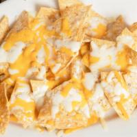 Nachos With Cheese · Tortilla chips with melted cheddar cheese.