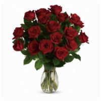 18 Red Roses · Roses symbolize tradition, romance, passion, and love, and have now become appropriate for n...