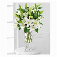Winter White Lilies · A tall vase of oriental lilies is on everyone's holiday list. Perfect for winter parties or ...
