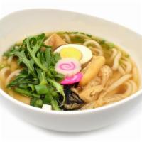 Udon/우동 · Udon noodle soup with fish cake, abura-age, crown daisy, scallion, and half of a boiled egg ...