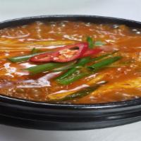 Kimchi - Jjigae · Spicy kimchi soup with tofu and pork.