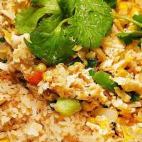 R6 Crab Fried Rice  · Stir-fried jasmine rice blended with egg, onions, tomatoes, diced mix vegetables, and Dungen...