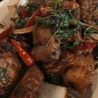 Hs11 Crispy Rosted Pork Basil  · Stir-fried crispy rosted pork with ground fresh chili, onions, bell peppers, and Thai hot ba...