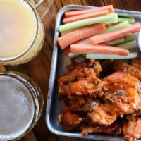 Chicken Wings · Blue Cheese, Buffalo Sauce, Carrots, Celery
