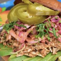 Pulled Chicken & Avocado · Pulled Chicken, Smashed Black Beans, Spicy Cabbage Slaw, Pickled Jalapeños, Brioche Bun
