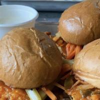 Buffalo Chicken Sliders · Blue Cheese Dressing, Pickled Carrots & Celery