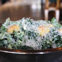 Kale Caesar · Cornbread Croutons, Shaved Parmesan, Caesar Dressing