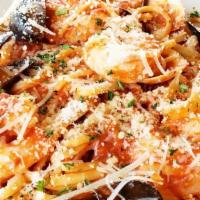 Linguini Di Maria · With shrimp, scallops, calamari, mussels toasted with linguini pasta in your choice of sauce.