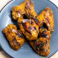 Peri Peri Wings Split  (5) · Flame-grilled whole wings with choice of flavor.