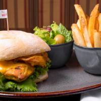 Double Chicken Breast Burger One Side · Marinated double chicken breast in Peri Peri flavor of your choice, mayonnaise, lettuce, tom...