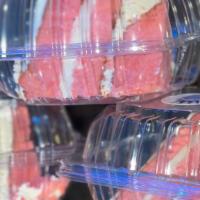 Cake By The Slice · Two layers of our moist cake with Swiss Meringue buttercream. <br /><br />Our cake slices ar...