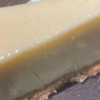 Cheesecake By The Slice · Homemade cheesecake with a homemade graham cracker crust.