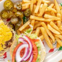 Grilled Cheese Burger · Served with lettuce, tomato, onions, jalapeños and French fries.