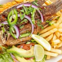 Mojarra Frita · Whole fried tilapia. Served with rice, French fries and salad.
