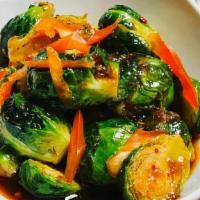 Brussels Sprouts · Tir-fried brussels sprouts in spicy and sweet brown sauce.