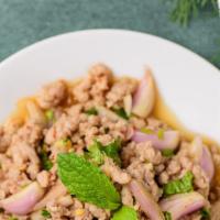 Larb Salad · Seasoned with red onion, green onion, cilantro, roasted rice powder, thai chili, and house d...