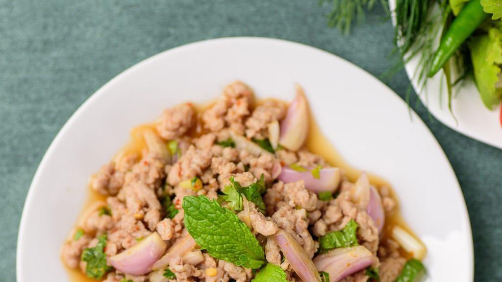Larb Salad · Seasoned with red onion, green onion, cilantro, roasted rice powder, thai chili, and house dressing.