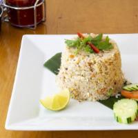 Crab Fried Rice · Rice stir-fried with egg, carrot, real crabmeat, white onion, and green onion.